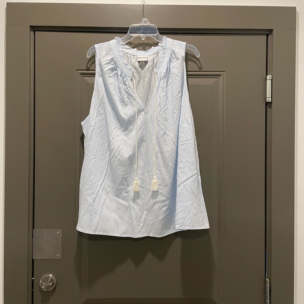Sleeveless Light Blue Tassel Tie Blouse